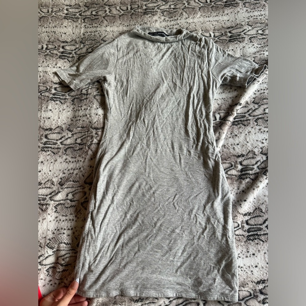 Naked wardrobe, gray dress